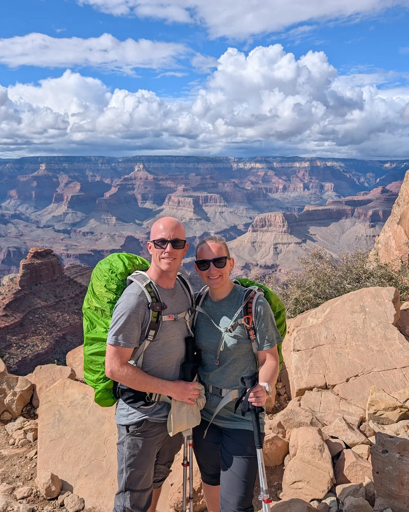 Jay and Maud with their backpacks on the Grand Canyon rim